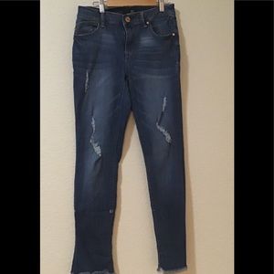 Light Distressed Blue Jeans